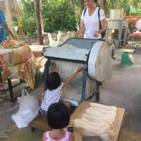Making rice noodle in Mekong Delta trip with ALO Travel Asia